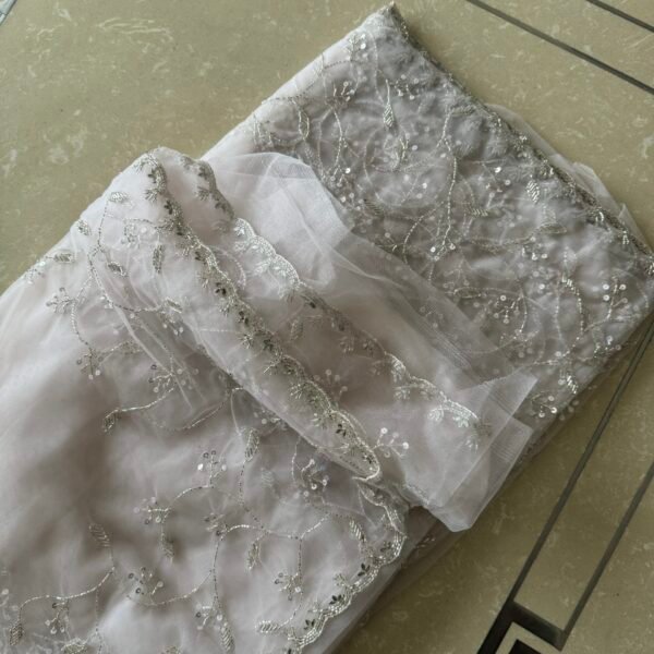 Pure Elegance: Embroidered White Saree